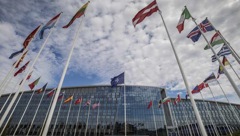 Shots of NATO Flags and sculpture