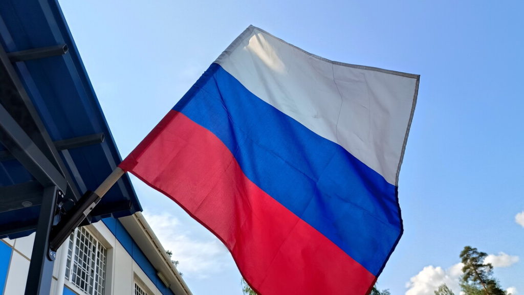 русија