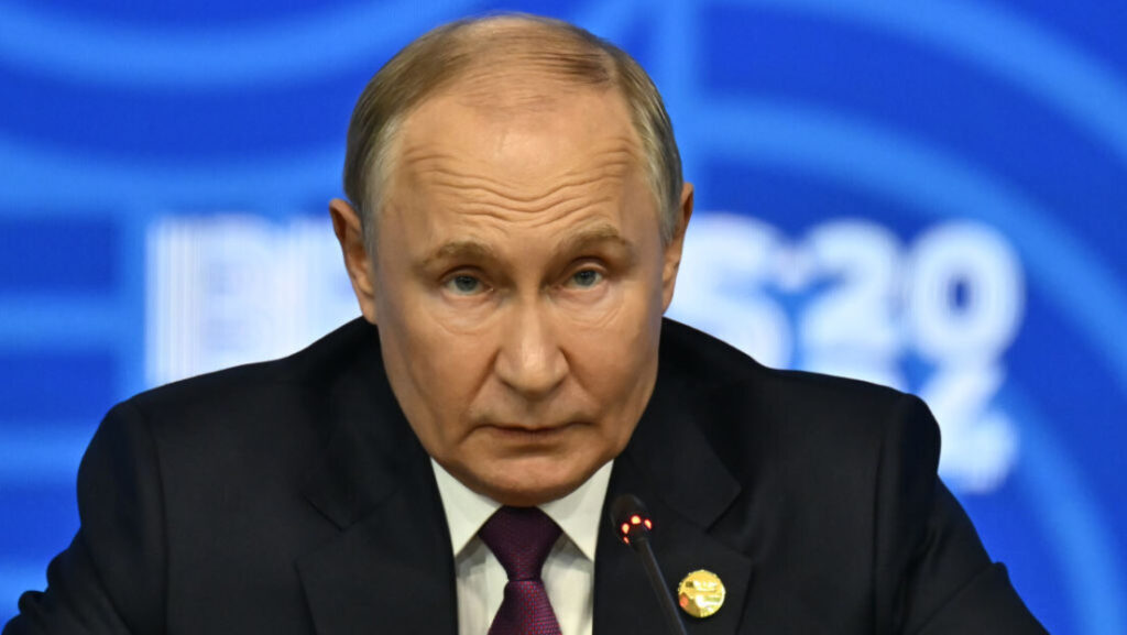 Путин