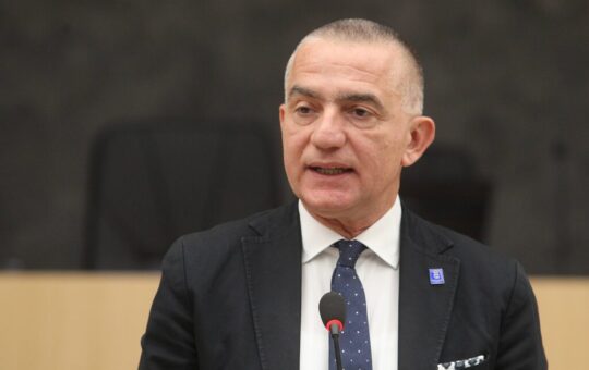 министар
