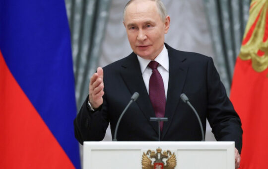 Путин