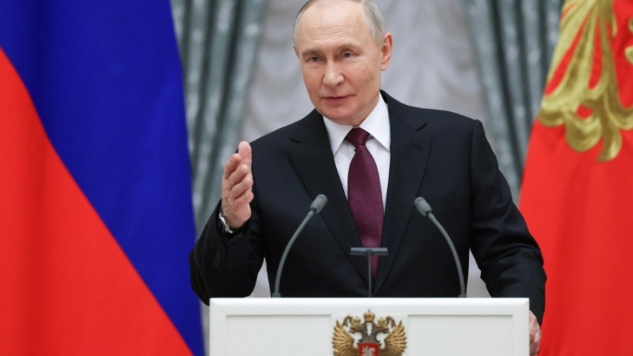 Путин